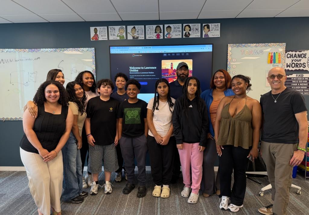 Lawrence Unidos students and mentors gathered in the classroom